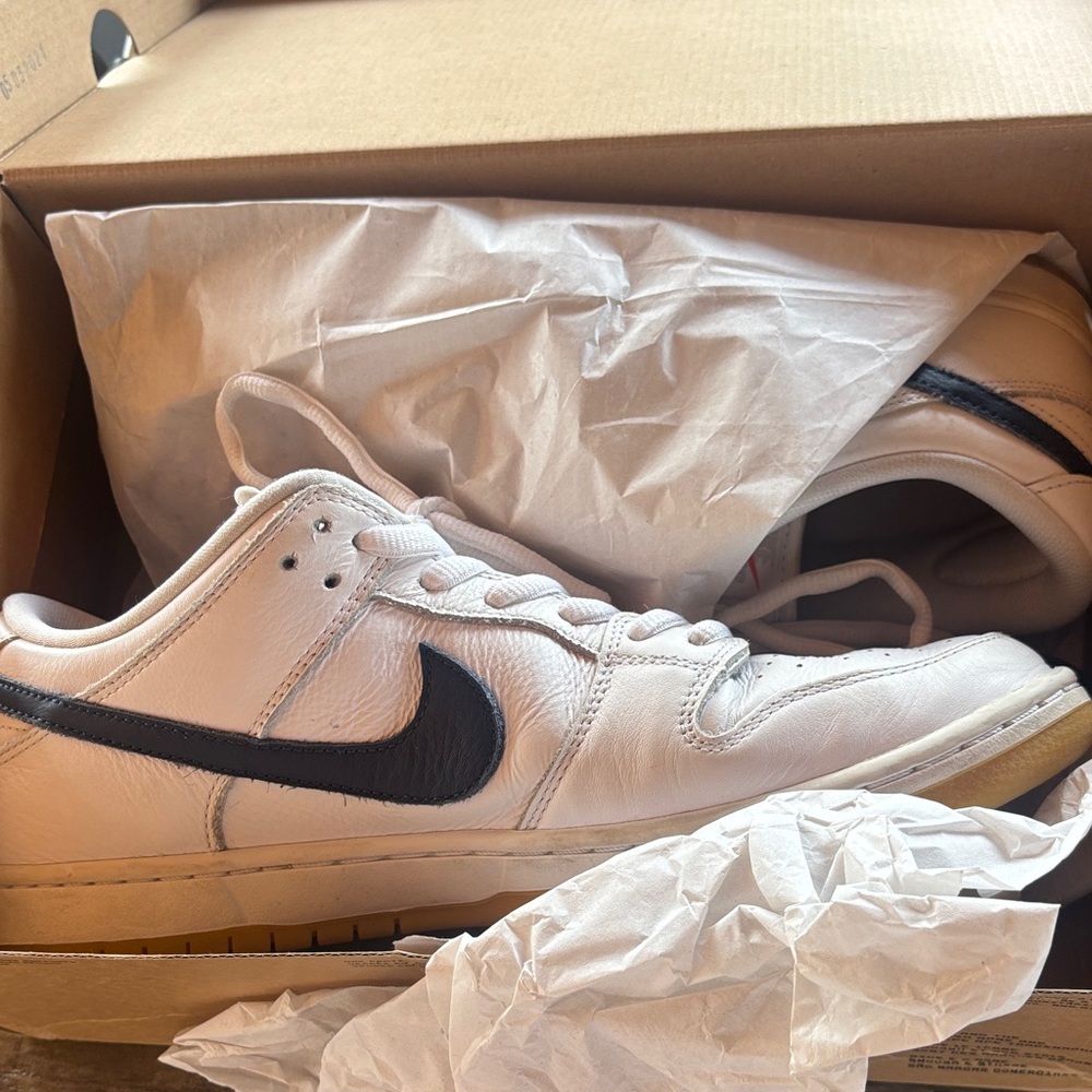 Nike Men's White and Black Leather Sneakers